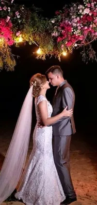 This stunning phone live wallpaper captures a romantic moment between a bride and groom