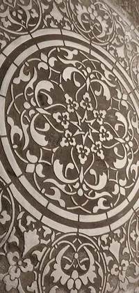 This phone live wallpaper exhibits a visually stunning and intricate floor design with an Arabesque style, characterized by its flickr-inspired pattern and soft, etched relief