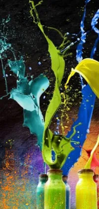 This stunning live wallpaper features two colorful bottles of paint that appear to be exploding with vibrant colors