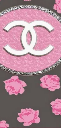 Introducing a trendy live wallpaper for a phone featuring a black and pink case with a Chanel logo