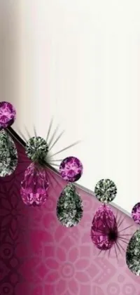This stunning live wallpaper features a digital rendering of a close-up mirror with tear drop-shaped crystals