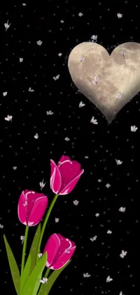 This live wallpaper features a digital rendering of a bouquet of pink tulips with a heart-shaped background against the romantic backdrop of the moon and falling snowflakes