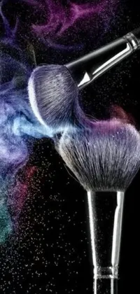 This live wallpaper features a shimmery makeup brush sprinkled with colored powder, creating an airbrush-like effect