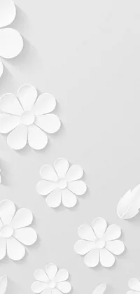 This mobile live wallpaper features a stunning collection of paper flowers arranged on a wall