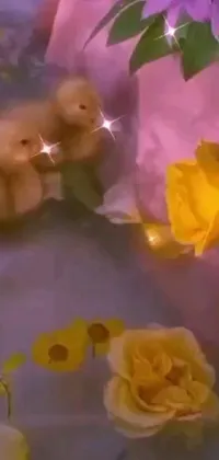 This live wallpaper features adorable teddy bears in the midst of colorful flowers, with a cute duck at a nearby table