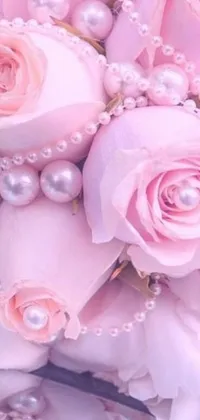 This live wallpaper features a beautiful bouquet of pink roses and pearls on a stylish table