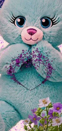 Looking for a cute and colorful live wallpaper for your phone? Check out this Lisa Frank-inspired design featuring a furry blue teddy bear and a bunch of beautiful flowers! The background is a dreamy pastel pink with swirls of light blue and yellow, and the glitter gif adds a touch of sparkle and magic to the overall design