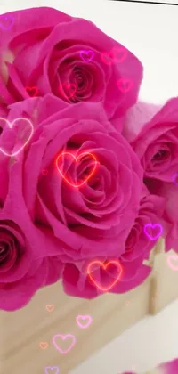 This live wallpaper showcases a beautiful bunch of pink roses displayed in a wooden box