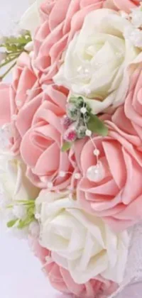 Enhance your mobile screen's beauty with this charming live wallpaper! A close-up shot of a lovely bouquet of flowers held on an elegant table featuring lacey decor and foam