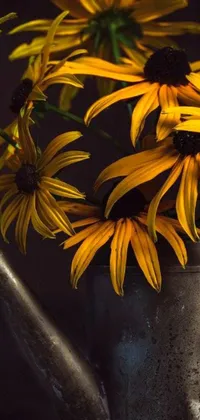 This phone live wallpaper depicts a still life by Pexels featuring a metal watering can with sunflowers in it on a black background