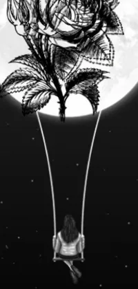 This surreal phone live wallpaper features a striking black and white photograph of a person sitting on a swing in front of a full moon