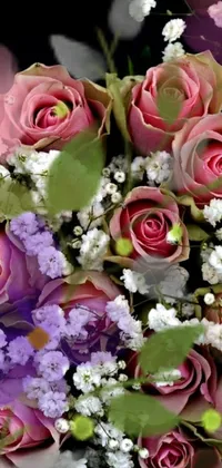 This phone live wallpaper showcases a stunning close up of colorful flowers, featuring roses, gypsophila, and lilacs