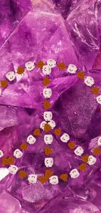 This phone live wallpaper features a cute group of teddy bears sitting on top of purple crystals