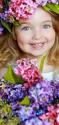 This live wallpaper features a charming young girl holding a bouquet of flowers that change with the seasons - lilacs in spring, colorful blooms and butterflies in summer, leaves in fall, and snowflakes in winter
