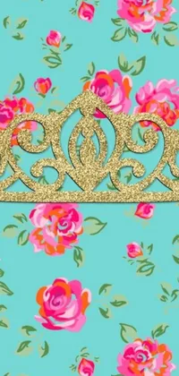 This phone live wallpaper features a golden crown atop a blue background with a flowery design in turquoise, pink, and green hues, complete with a Tiffany-style aesthetic and glitter effect for added charm