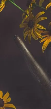 This phone live wallpaper features a stunning still life arrangement with a yellow flower-filled vase on a wooden table