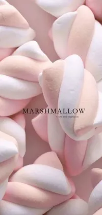 Looking for a delightful and whimsical phone live wallpaper? Look no further than this fun design! Featuring a stack of fluffy marshmallows against a light blush background, this wallpaper also includes a charming album cover in elegant script