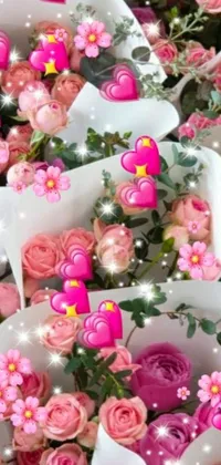 This animated live wallpaper features a charming scene of pink cupcakes arranged tastefully on a table with floral bouquets and a framed photo adding a romantic touch