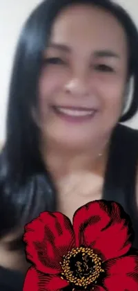 This live wallpaper features a mature, Colombian woman with long black hair and a red flower tucked behind her ear