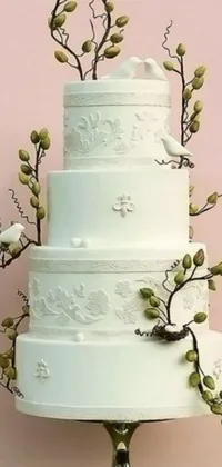 This phone live wallpaper features a stunning white wedding cake set upon a table amidst a serene pastel color scheme