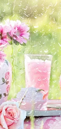 A delightful phone live wallpaper showcasing a pink flower-filled pitcher resting on a table