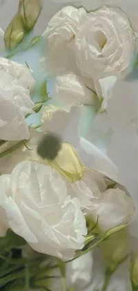 This phone live wallpaper features a realistic painting of white flowers arranged on a wooden table