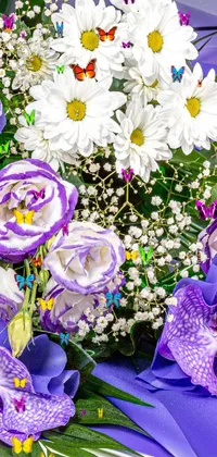 This stunning phone live wallpaper showcases a bouquet of purple and white flowers arranged artfully on a table, enhanced with a touch of bauhaus-inspired design