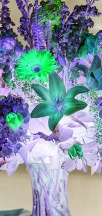 This phone live wallpaper features a stunning vase filled with a beautiful arrangement of purple and green flowers