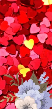 This stunning phone live wallpaper features a beautiful bouquet of flowers with a bed of hearts background