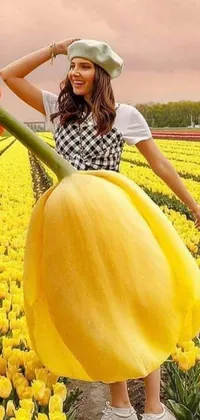 Looking for a stunning phone wallpaper that will take your breath away? Check out this hyperrealistic painting of a woman standing in a field of yellow tulips, holding a giant strawberry