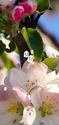 This phone live wallpaper showcases a stunning close-up of a digital flower on a tree, surrounded by adorable ghost illustrations perfect for Halloween