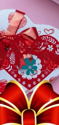 The heart-shaped box live wallpaper features a festive design that would make a delightful addition to any device