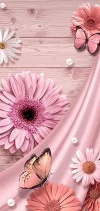 This mobile phone live wallpaper showcases a rustic wooden table decorated with a lovely arrangement of pink flowers and a delicate butterfly