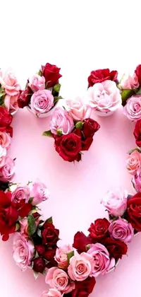 This phone live wallpaper showcases a charming heart made out of pink and red roses on a customized background