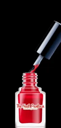 This stunning live wallpaper features a realistic image of a nail polish bottle against a black background with bold red lettering