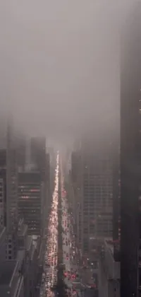This phone live wallpaper showcases a bustling and foggy metropolis on a cloudy day