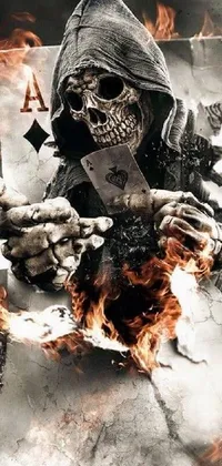 This live wallpaper features a skeleton on top of a burning playing card with an action movie poster and Tumblr-inspired design