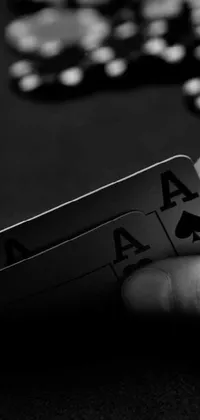 Get a close-up view of a beautifully designed playing card with this black and white photo live wallpaper