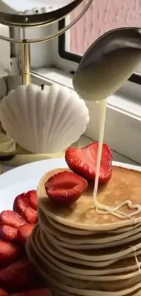 Looking for a fun and unique phone live wallpaper? Check out this tumblr-inspired wallpaper featuring a stack of pancakes on a white plate, with strawberries scattered around and a whimsical fairy flying around with a zombified look