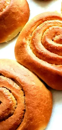 This stunning phone live wallpaper showcases a delicious selection of rolls arranged in a hurufiyya style