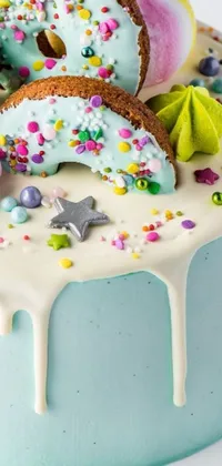 This phone live wallpaper showcases a cake with frosting and sprinkles