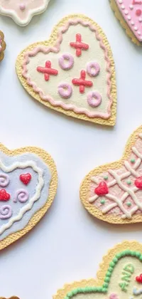 This delectable live wallpaper features a closeup of beautifully decorated cookies with ornamental edges