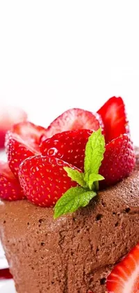 This live wallpaper presents a piece of chocolate cake adorned with fresh strawberries, ideal for those with a sweet tooth