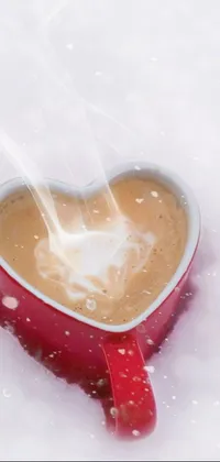 This phone live wallpaper brings cozy romance to your screen with a steaming cup of coffee