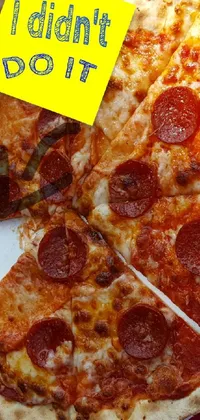 Enjoy a unique live wallpaper featuring two slices of pepperoni pizza on a plate! This close-up photograph takes you right into the delicious details and textures of the pizza