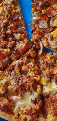 Indulge in a mouth-watering live wallpaper of a delicious pizza topped with savory meat texture, crunchy nachos, and sitting on a vibrant blue plate