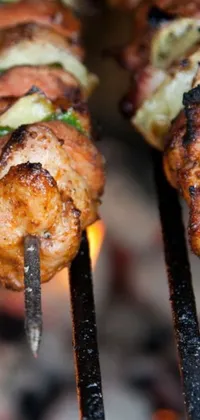 This phone live wallpaper features a captivating composition of grilled meat on skewers