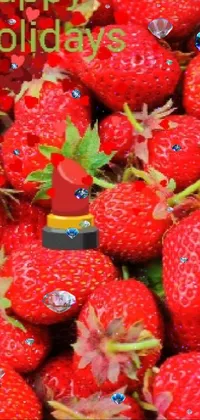 This phone live wallpaper depicts a vibrant close-up of ripe strawberries rendered digitally