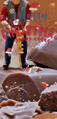 This phone live wallpaper has a tilt-shift photograph featuring two men standing atop a chocolate piece