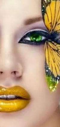 This stunning phone live wallpaper features the image of a woman with a butterfly perched delicately on her face